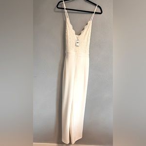 Express cream spaghetti strap one piece.